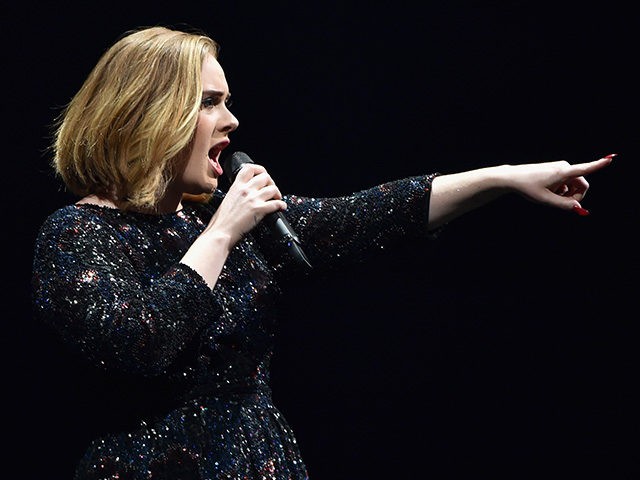 British singer Adele scolding a fan for filming her during concert as she did in the Italian city of love, Verona, on May 29, 2016