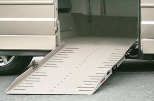 Wheelchair ramp-fitted vans such as this one are needed across urban spaces in Africa.