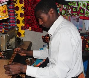 A tailor at work at Kenyatta Market in Nairobi, Kenya.
