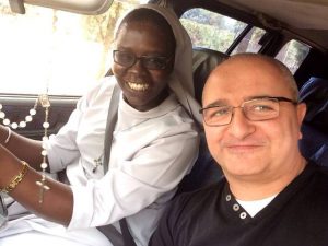 Prof Dominica Dipio with Fr Fabrizio Colombo in Kampala, Uganda