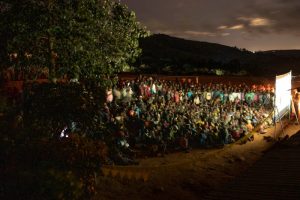 A Sunshine Cinema solar-powered cinema screening in Thyolo, Malawi, in March 2020, of The Boy Who Harnessed The Wind - during an impact tour for Participant Media. Photo by Sydelle Willow Smith